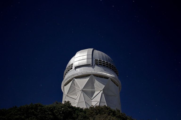 Telescope Study Reveals Cloud Patterns on Distant Exoplanet telescope pointed at a star-filled night sky