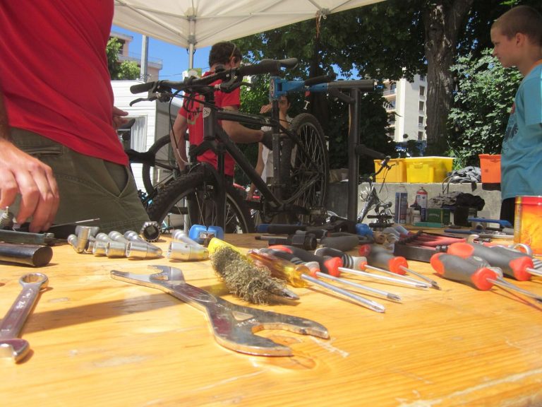 Tools and electronics on a repair workbench